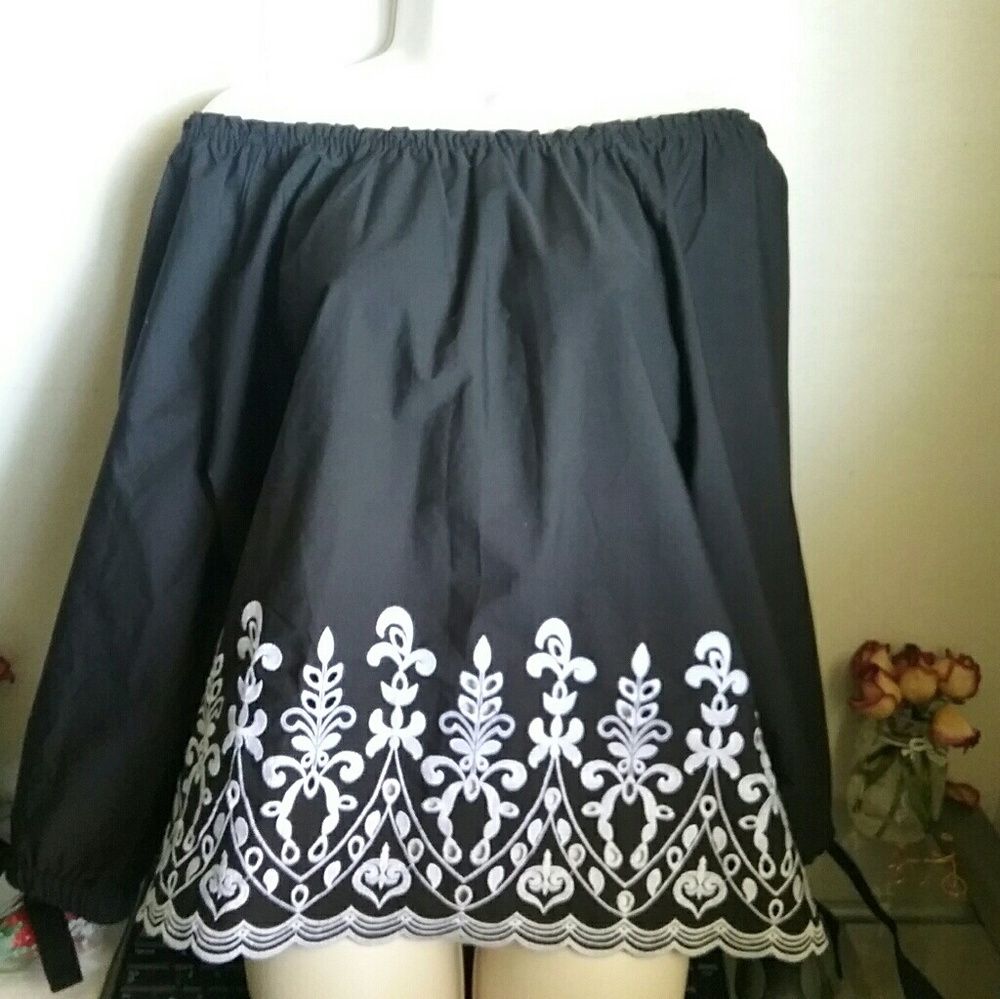Black, white embroidered, long-sleeve.
